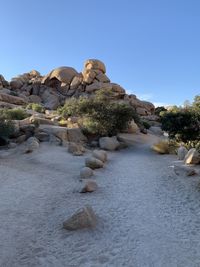 Rocks on shore against sky