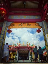 View of temple against cloudy sky