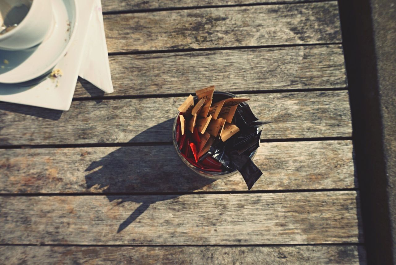 CLOSE-UP OF WOODEN PLANKS ON WOODEN PLANK