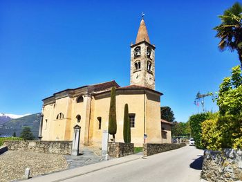 Low angle view of building against clear blue sky