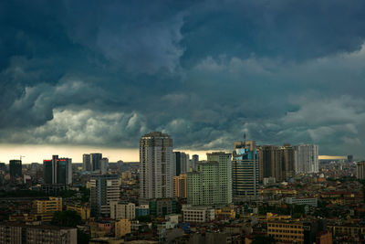 Modern buildings in city against sky