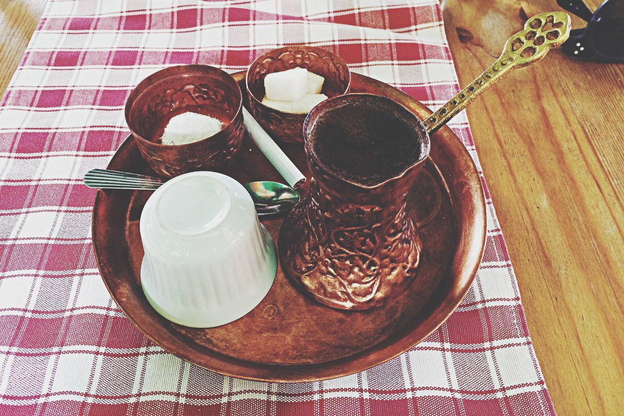 indoors, food and drink, table, still life, high angle view, plate, food, freshness, tablecloth, directly above, sweet food, ready-to-eat, drink, bowl, coffee cup, spoon, dessert, refreshment, indulgence, serving size