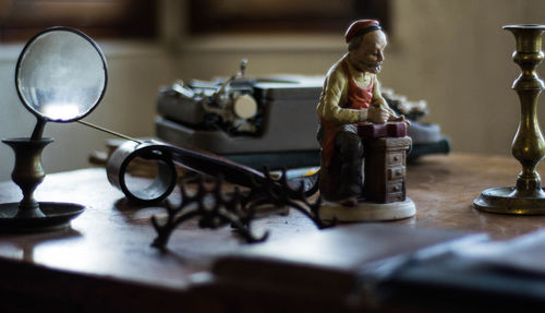 Close-up of statue on table