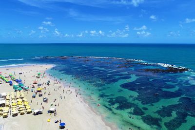 High angle view of beach against blue sky