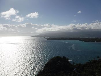 Scenic view of sea against cloudy sky