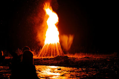 Bonfire on landscape at night