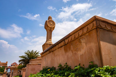 Low angle view of statue against sky