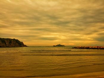 Scenic view of sea against sky during sunset