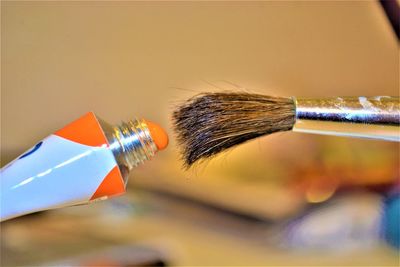 Close-up of paintbrushes on table