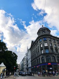 Low angle view of buildings against sky in city