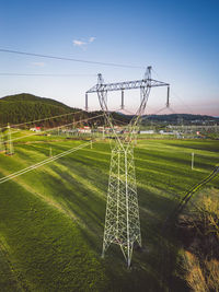 Scenic view of agricultural field against clear sky