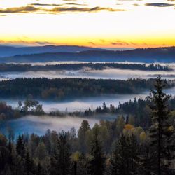 Scenic view of landscape against sky during sunset