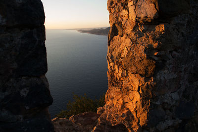 High angle view of sea through old ruins