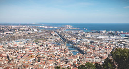 High angle shot of townscape against sky