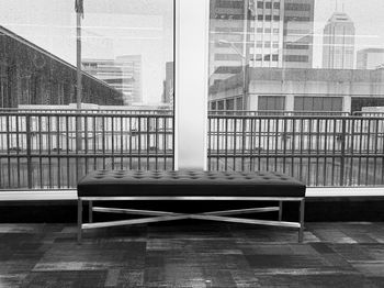 Empty chairs and tables in modern building