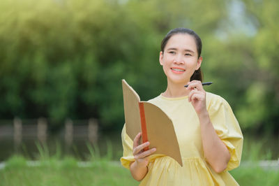 Portrait of a smiling young woman