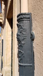 Close-up of old wooden wall against building