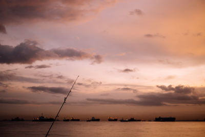 Scenic view of sea against sky at sunset