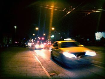 Blurred motion of cars on road at night