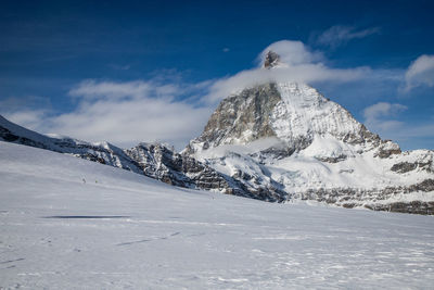 Scenic view of snowcapped mountain against sky