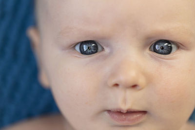 Close-up of cute boy at home