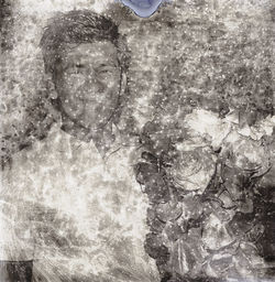 Digital composite image of man with reflection in water