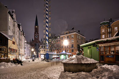 Illuminated buildings in city