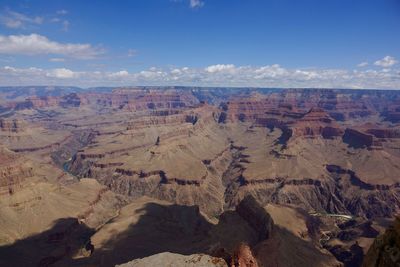 Scenic view of rocky mountains on sunny day at grand canyon national park