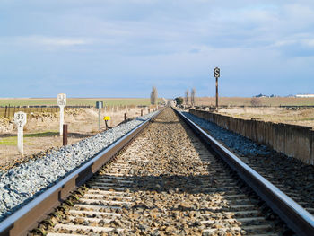 View of railroad tracks against sky