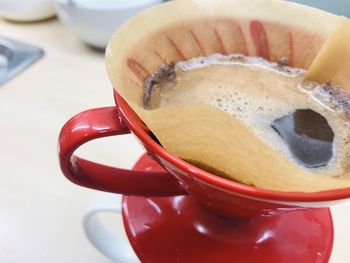 High angle view of coffee cup on table