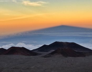 Scenic view of mountains during sunset