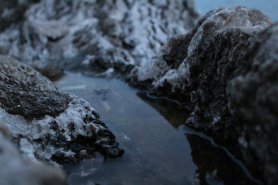 Close-up of rocks against sky