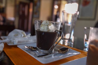 Close-up of coffee served on table