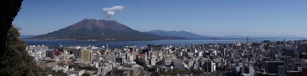 Panoramic view of sea and buildings in city