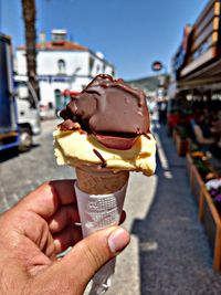 Woman holding ice cream cone