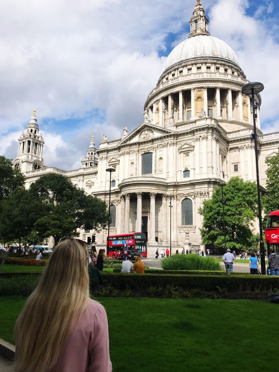 building exterior, architecture, built structure, plant, real people, rear view, nature, tree, cloud - sky, sky, women, travel destinations, building, religion, place of worship, travel, adult, hair, hairstyle, outdoors