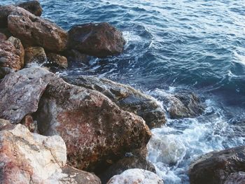 High angle view of rocks at beach