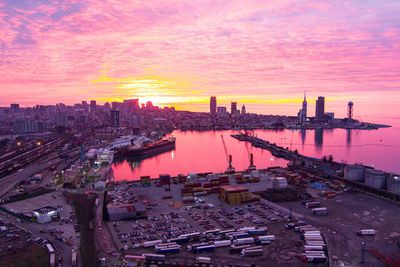 High angle view of buildings against sky during sunset