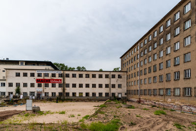 Buildings in city against sky