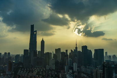 Panoramic view of buildings against sky during sunset