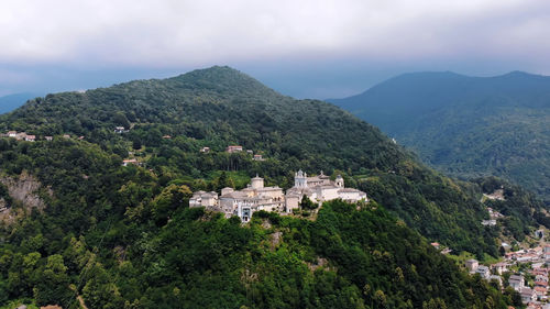 Aero view of beautiful shrine, ancient temple complex, big castle, sanctuary located in mountains 