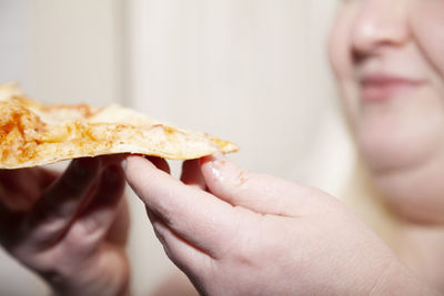 Close-up of woman holding ice cream