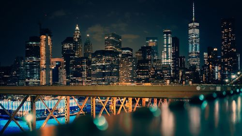 Illuminated city buildings at night