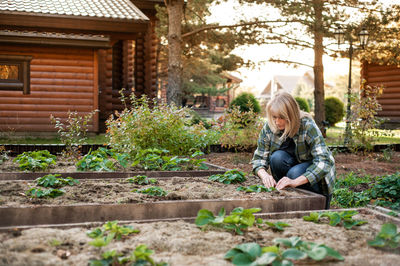 Mature woman working at garden