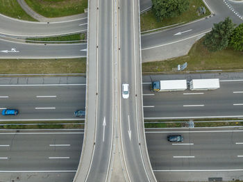 High angle view of elevated roads by trees in city