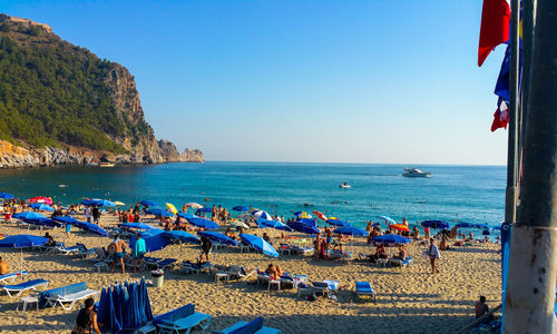 Scenic view of sea against clear blue sky