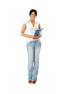Portrait of smiling woman standing against white background