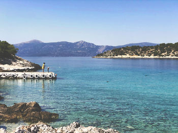 Scenic view of sea against clear sky