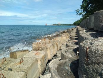 Panoramic view of sea shore against sky