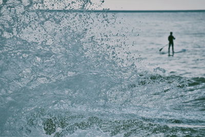 Man surfing in sea